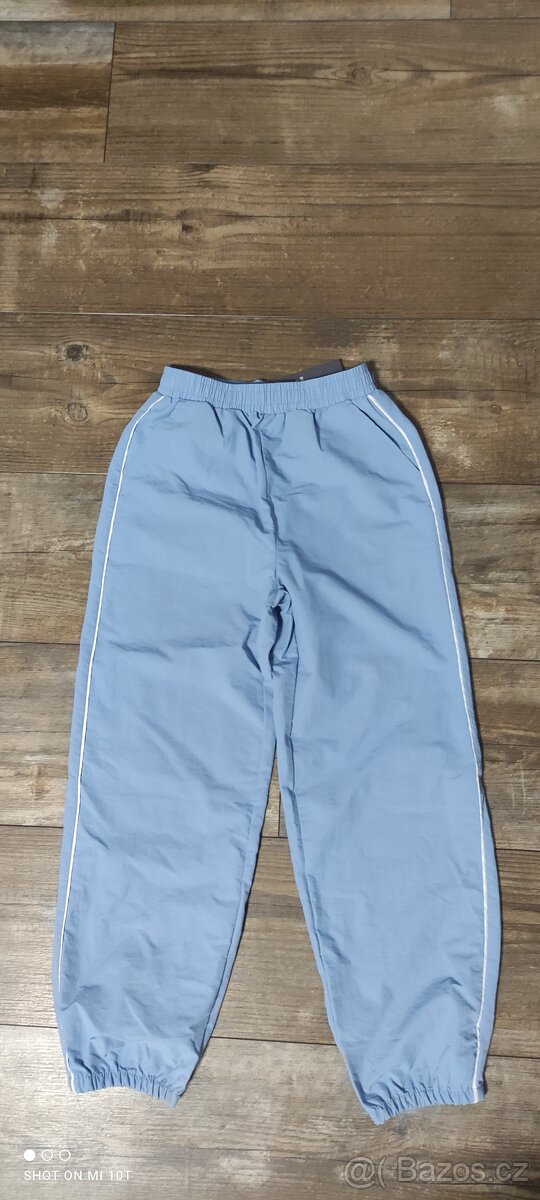 Nové - modré šusťáky