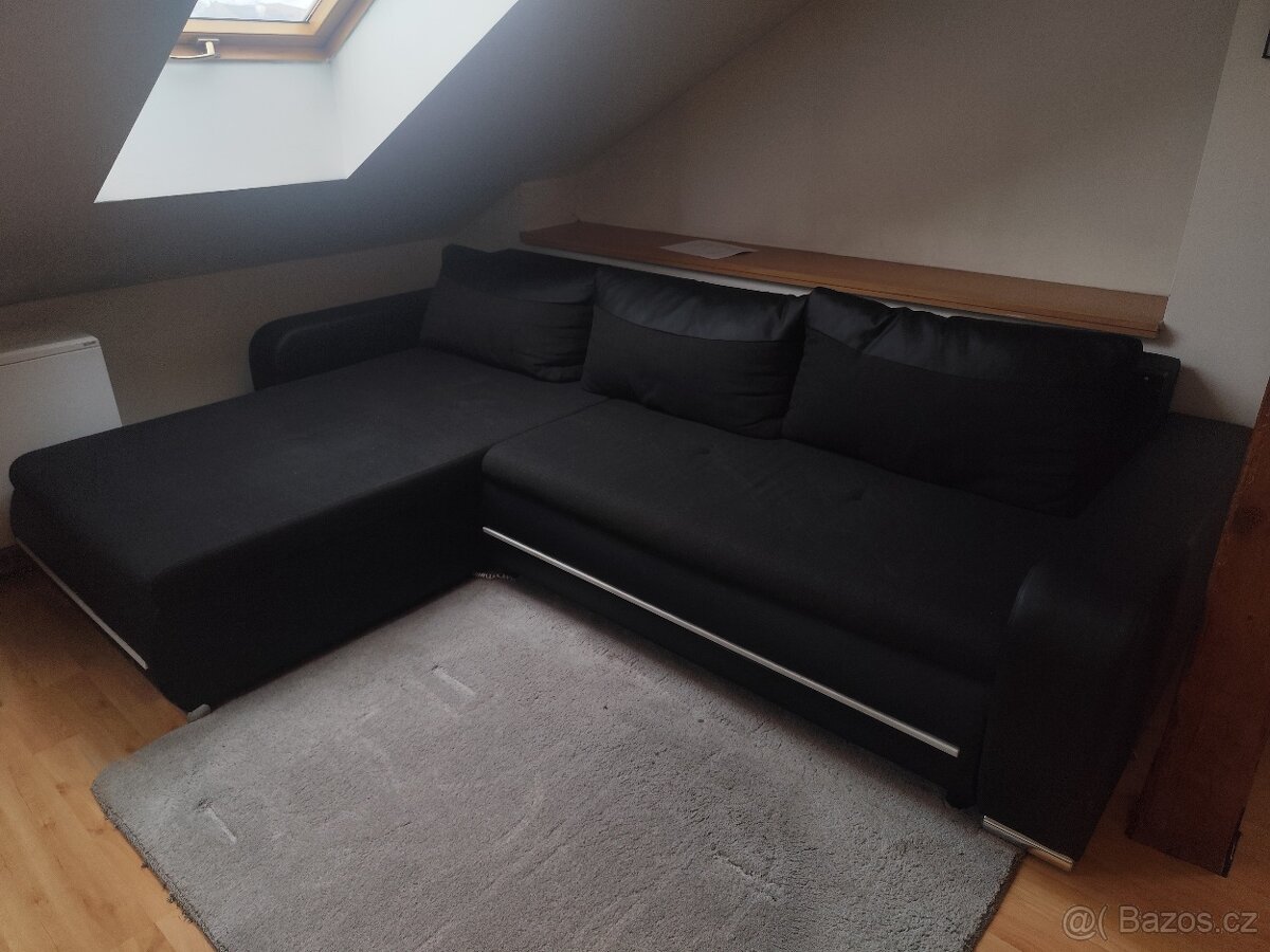 Rohový rozkládací gauč černá