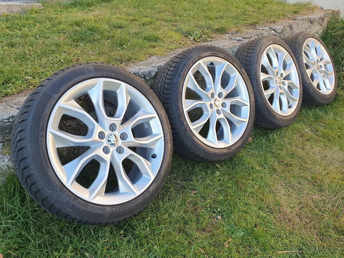 Zánovní alu zimní sada Škoda Kamiq 215/45/18