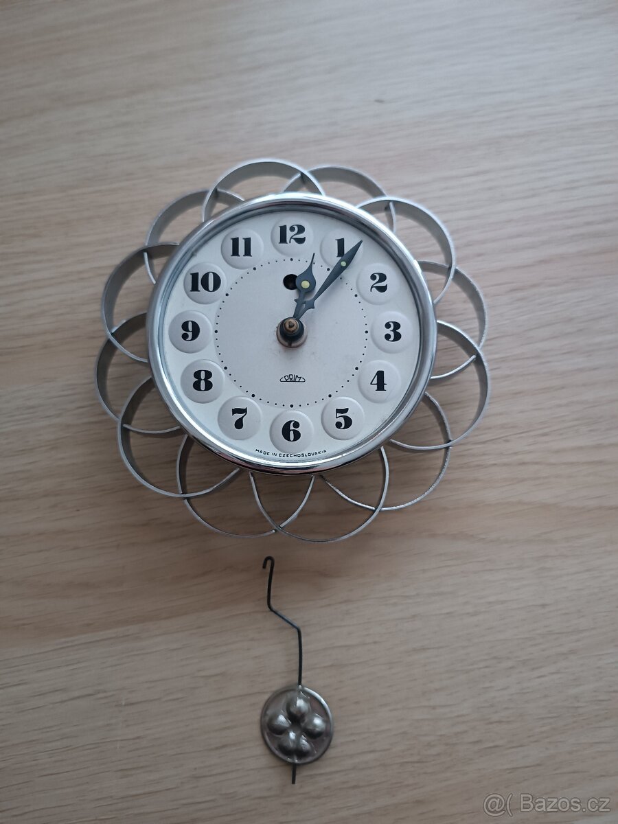 Nástěnné hodiny Prim