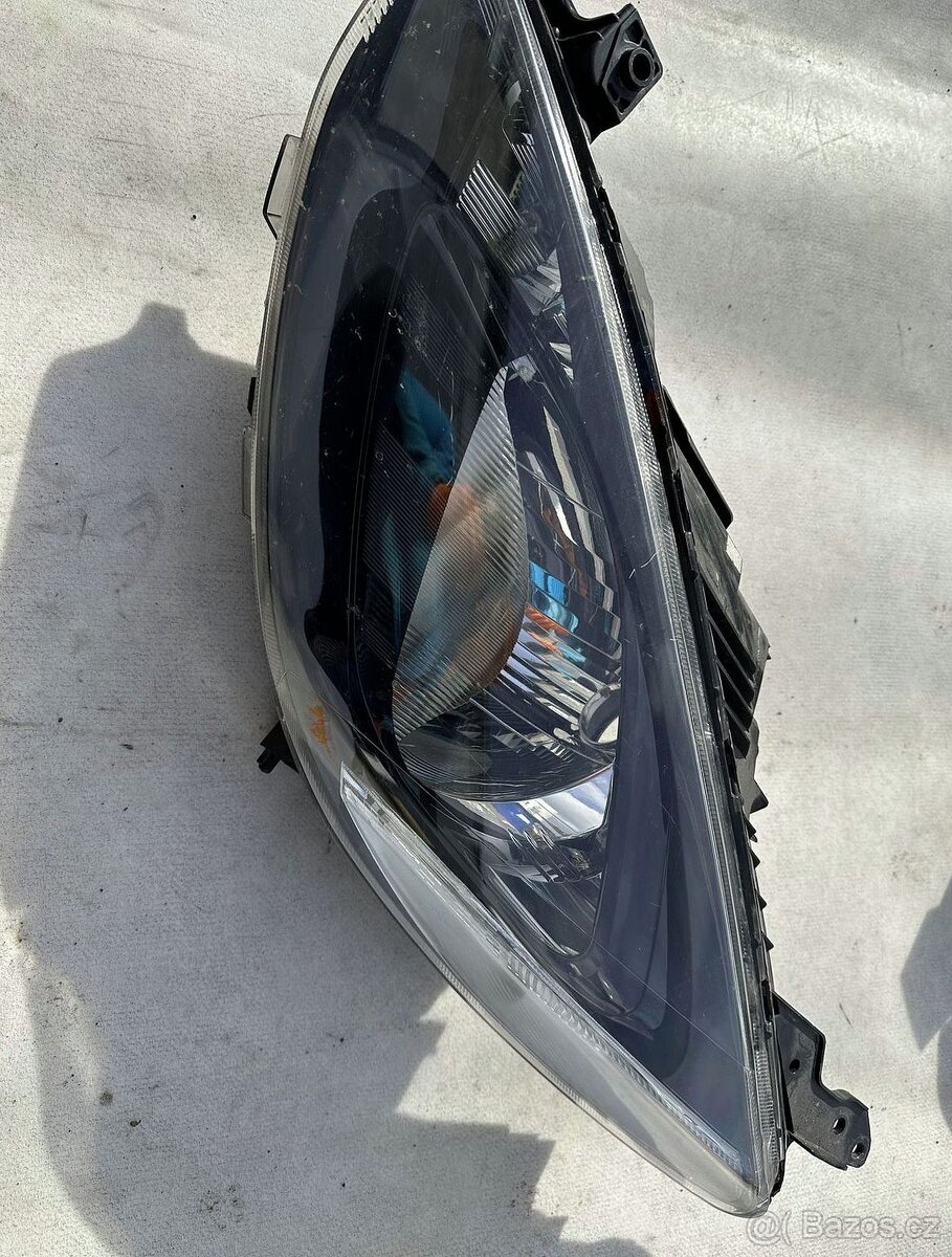 Mazda 2 DE, levé přední světlo