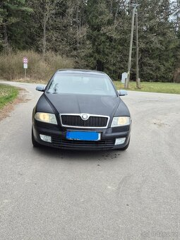 Š-Octávie combi 1.9TDi/77kW,rv.2005,barva.černá met.