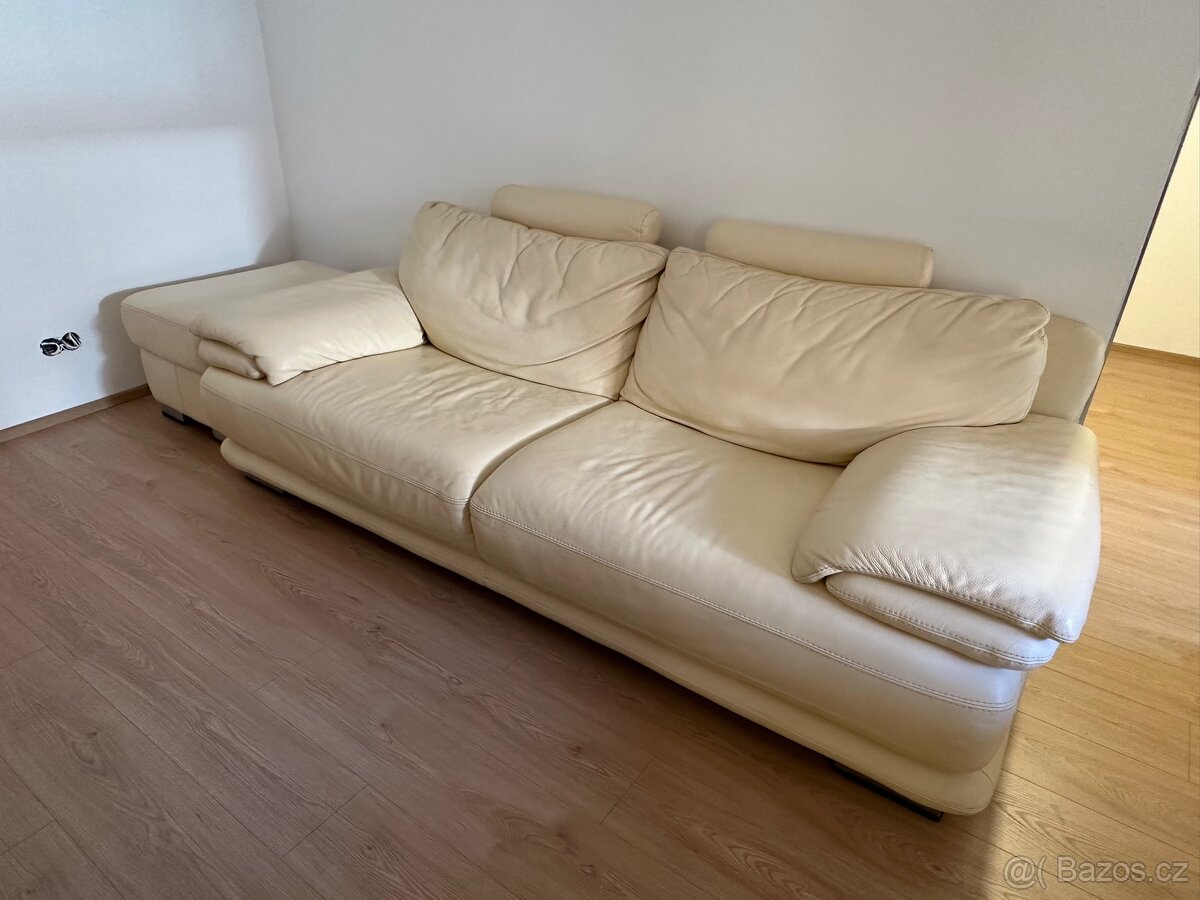 Kožená sedací souprava s taburetem krémová