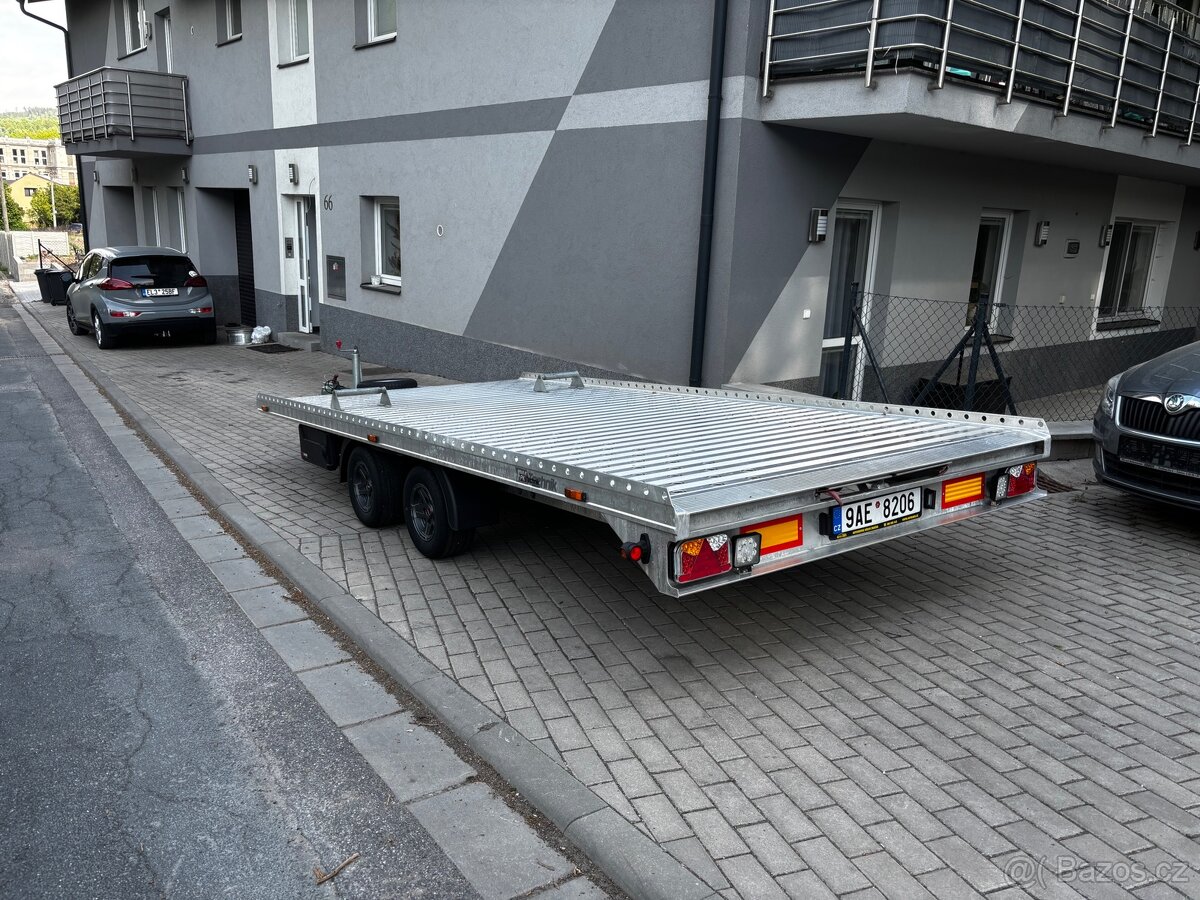 Gromex L4.6m 2700kg alu kola top stav
