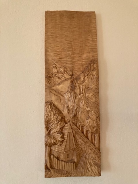 Ručně vyřezávaný dřevěný obraz