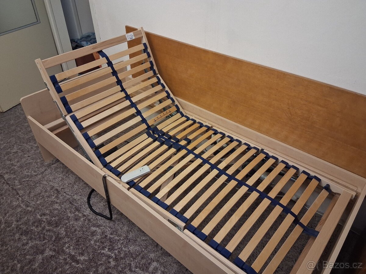 Polohovací postel - 2 elektromotory - zánovní