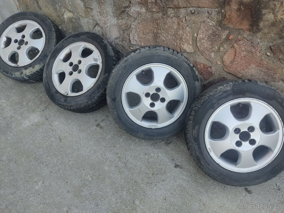 ALU DISKY 4x100 s letními pneu (Opel Astra g)