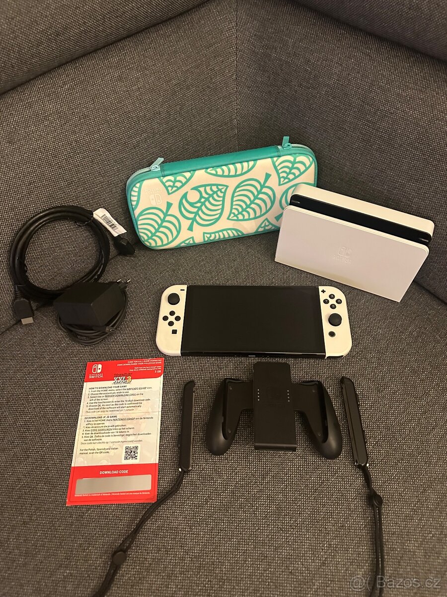 Nintendo Switch OLED + příslušenství a hra (top stav)