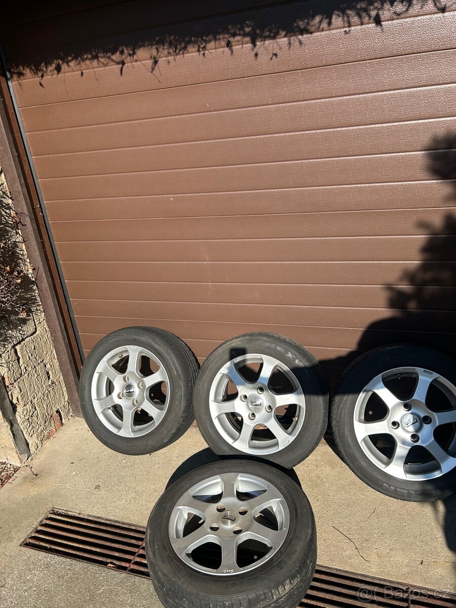 Alu kola+nexen Daewo Nubira 2004 -4x114,3 mm. 56,6 mm.