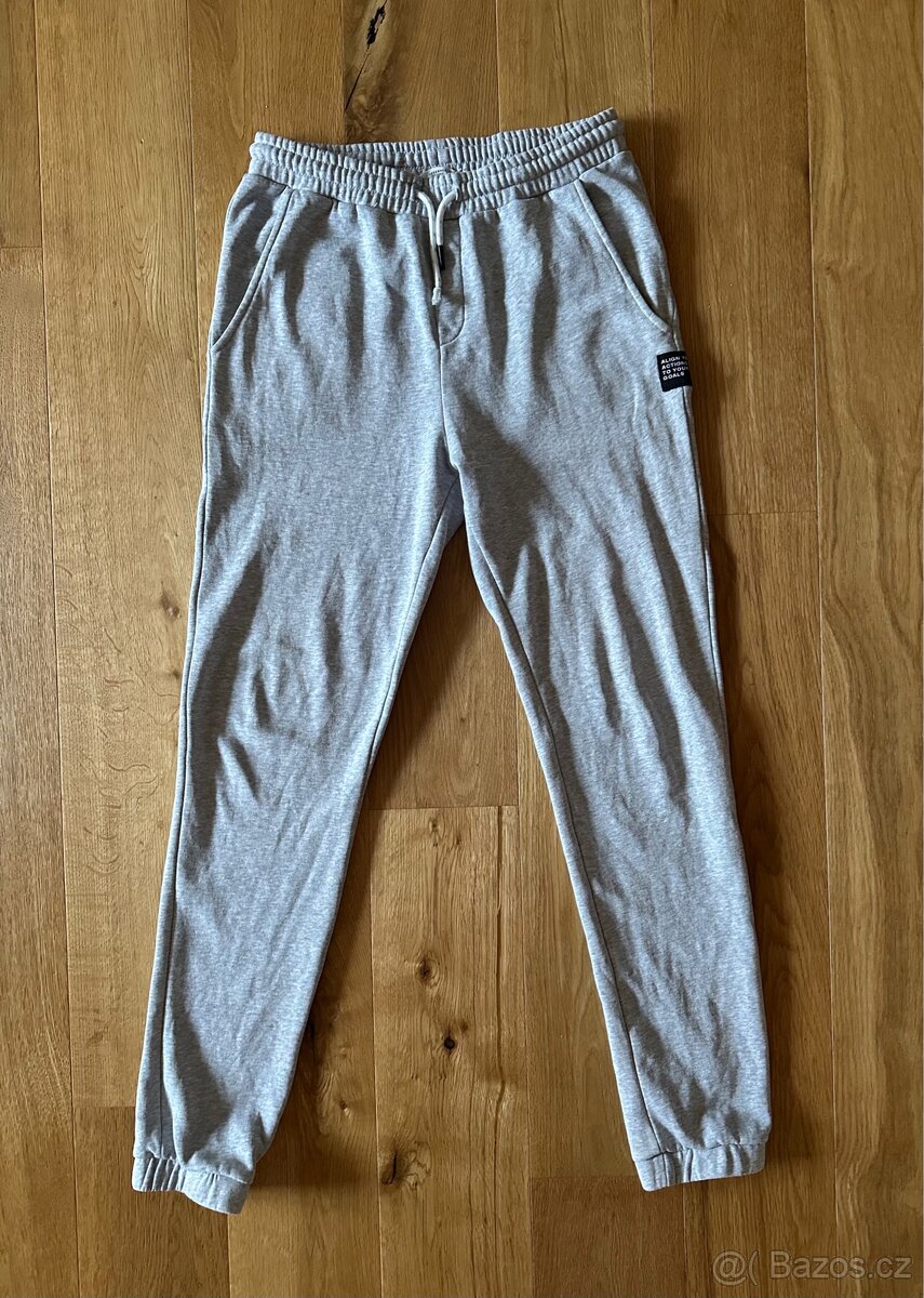 Tepláky s kapsami vel.170