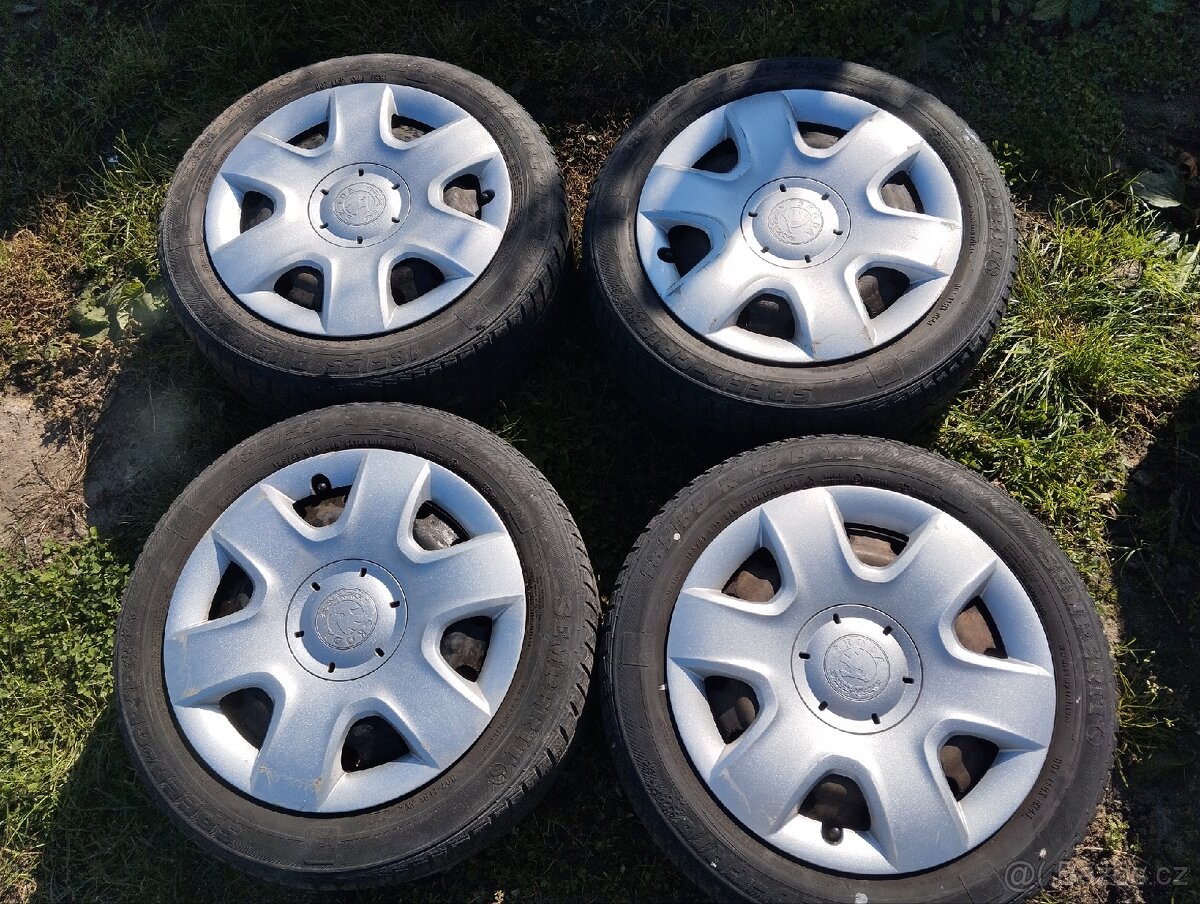 Plechové kola 5x100 R15 s poklicemi škoda
