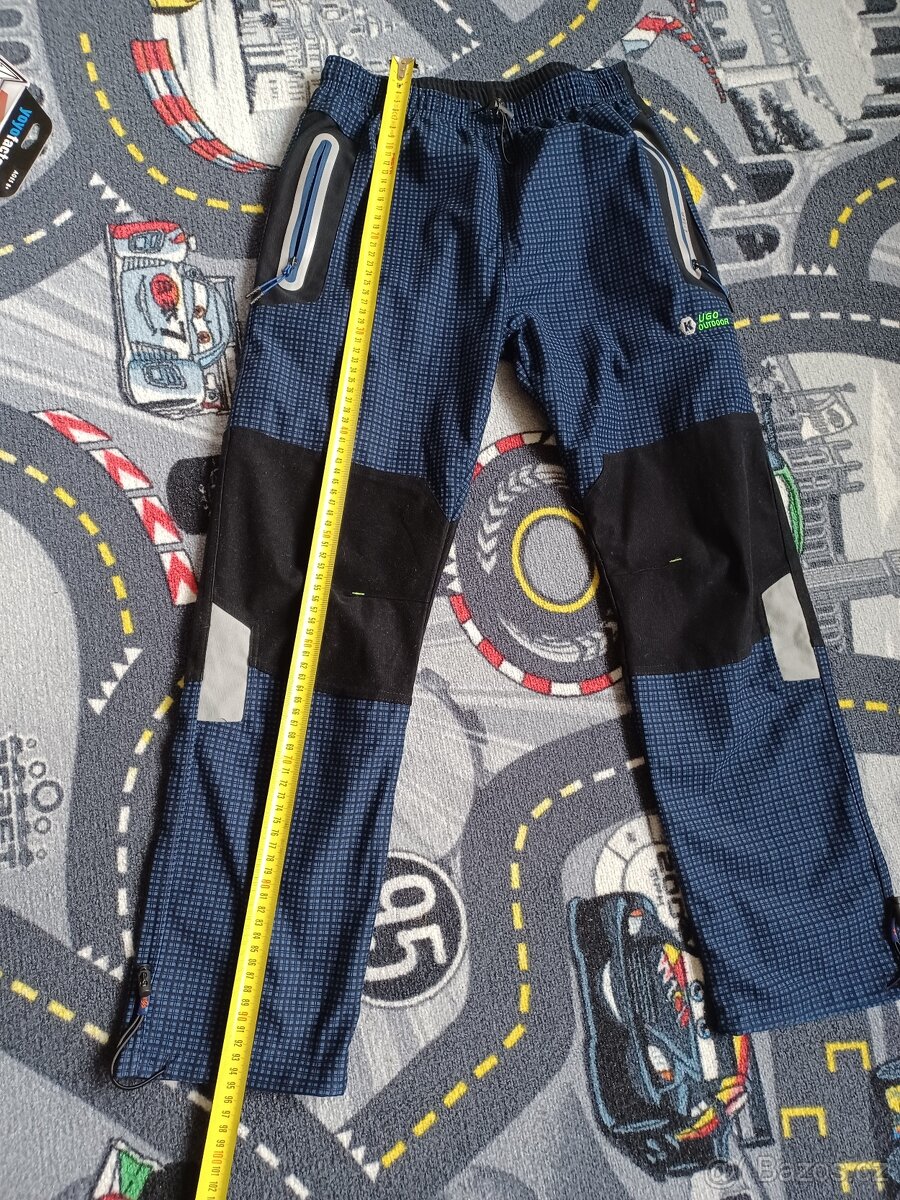 Kugo chlapecké kalhoty modré 158 reflexní kapsy