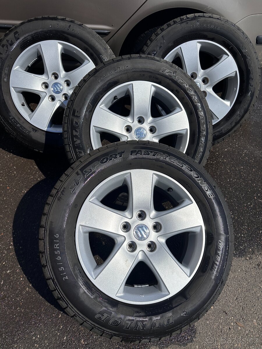 Letní kola 215/65/16 orig Suzuki top stav