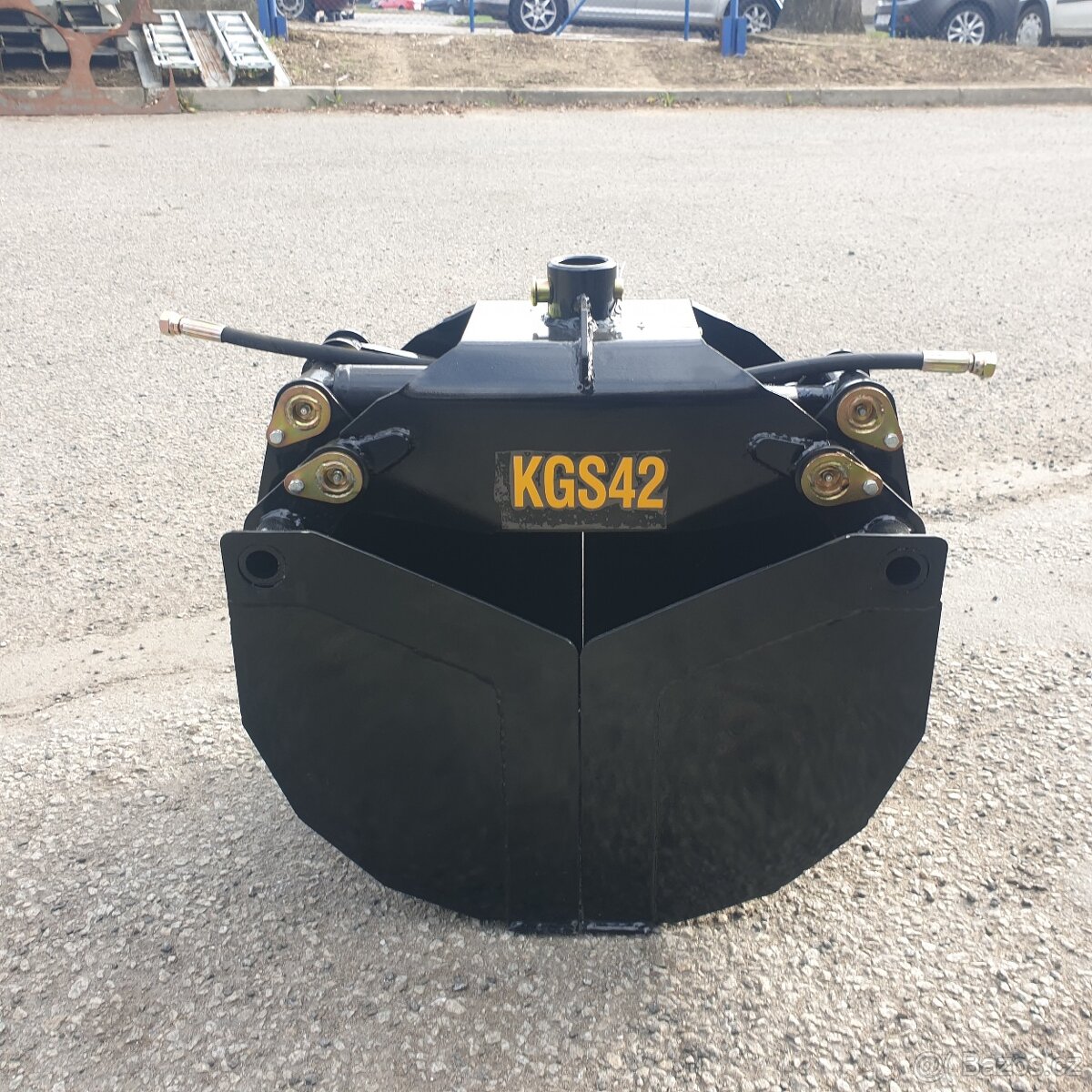 Hydraulický drapák na sypké hmoty