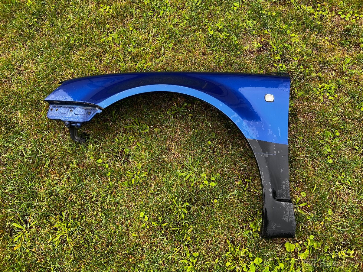 Levý přední blatník Škoda Superb 1