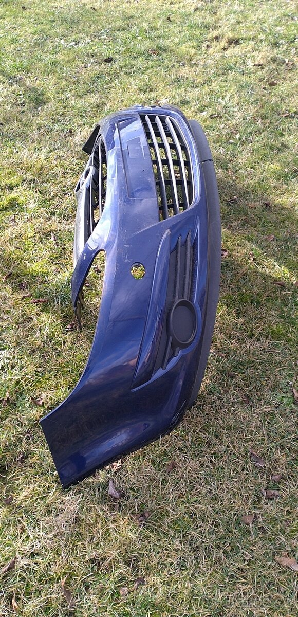 Přední nárazník Opel Corsa D