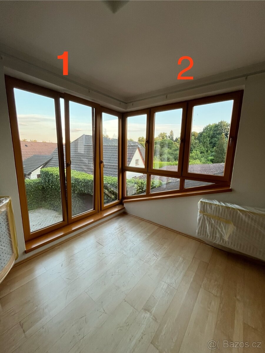 Hnědá plastová okna a balkonové dveře