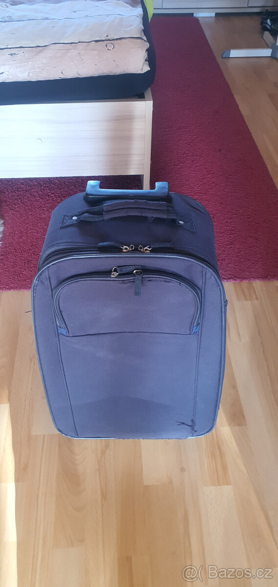 Cestovní kufr používaný