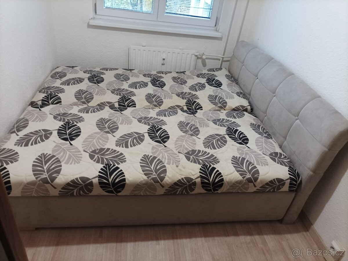Manželská postel s úložným prostorem