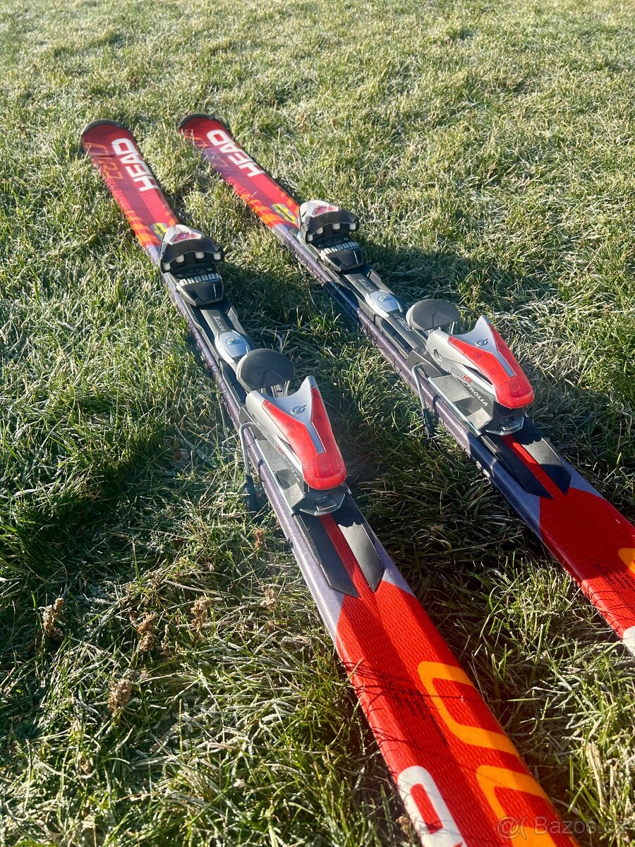 Lyže HEAD C210 s ladícími hůlkami zdarma TOP STAV