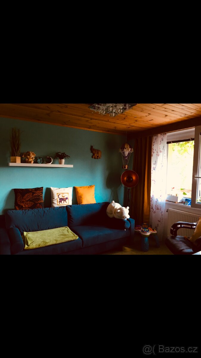 Rozkládací gauč tm. modrý