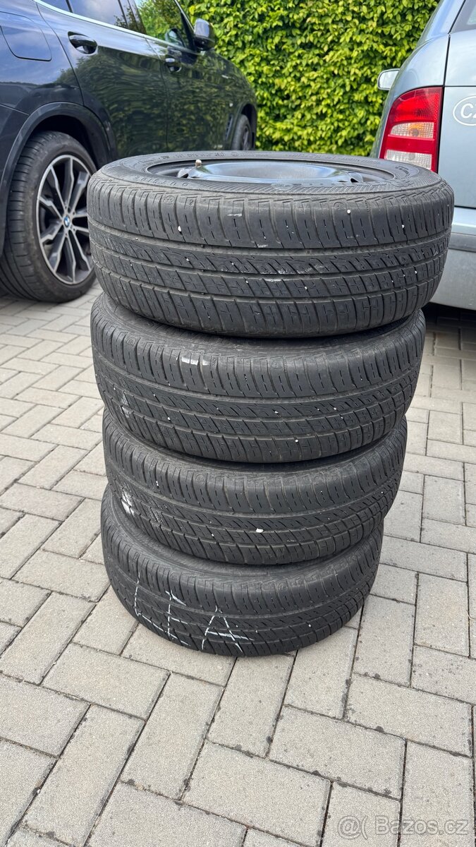 Letní pneumatiky na plechových discích 185/60 R14, Fabia 1
