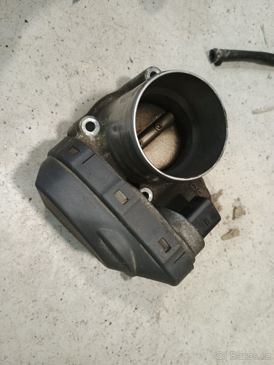 Škrtící klapka Vw Golf IV