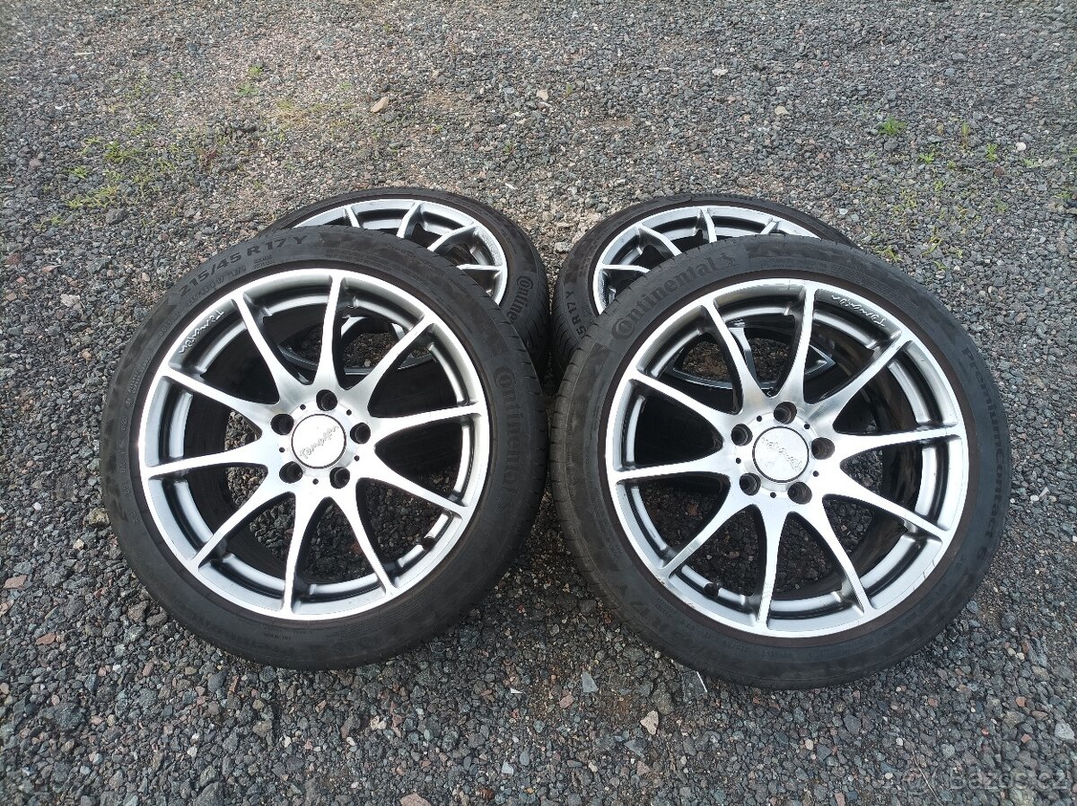 Alu kola Tomason 5x114,3 r17 et 40 pneu 215/45/17