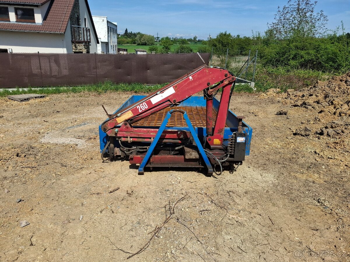 Kontejner s hydraulickou rukou