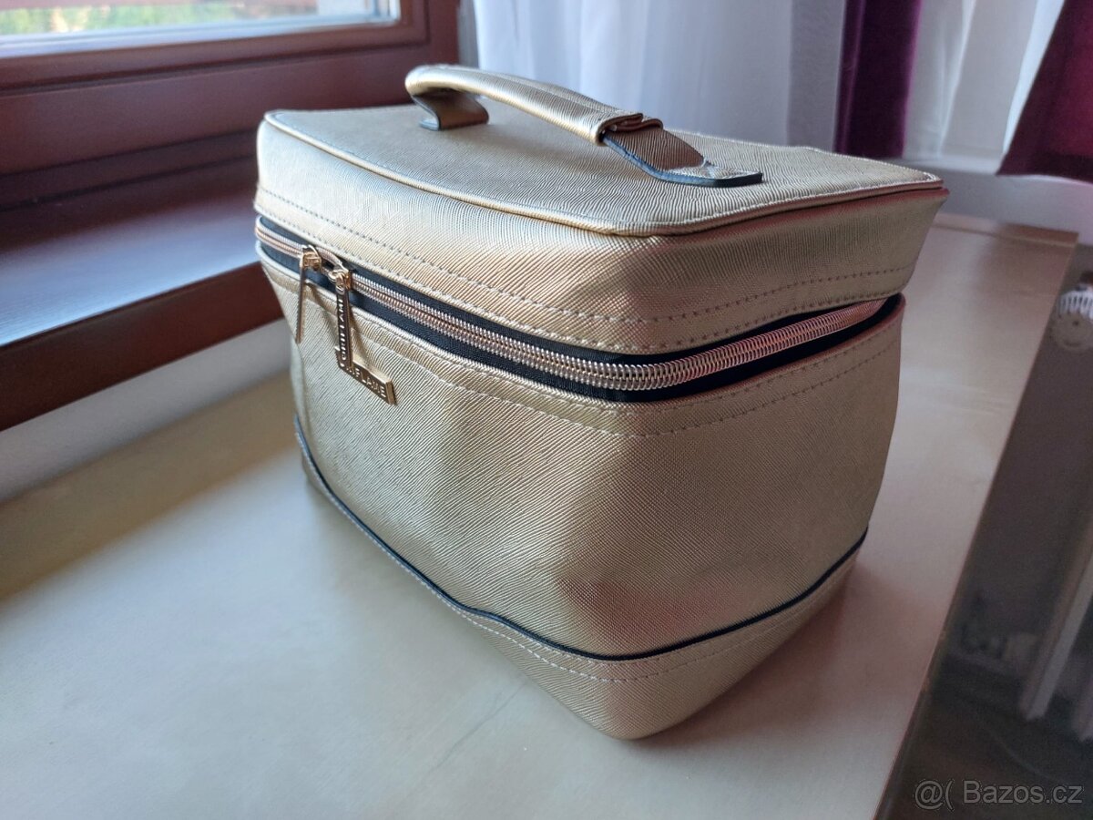 Zlatý kosmetický kufřík