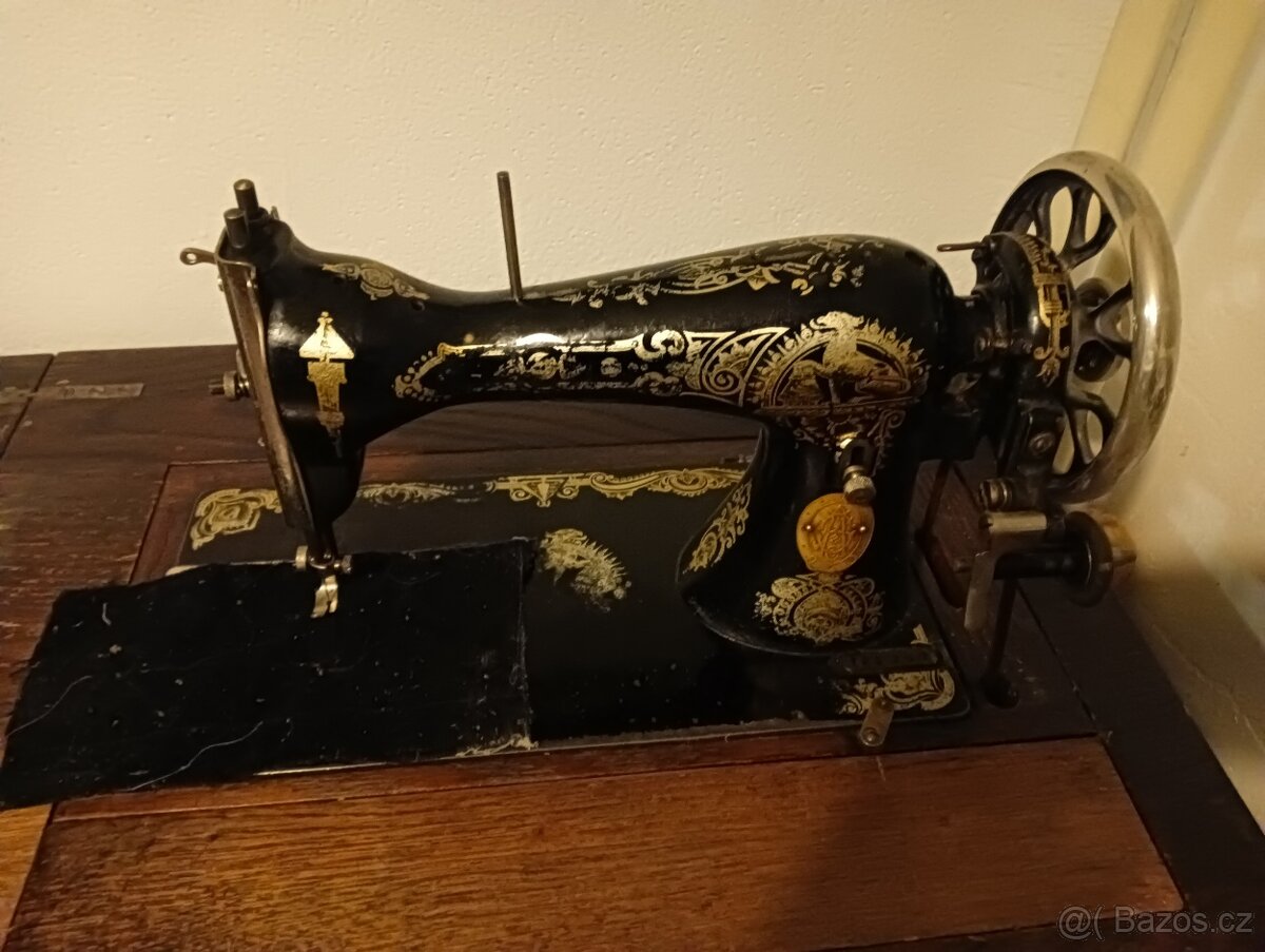 Šicí stroj Singer skříňkový elektrický