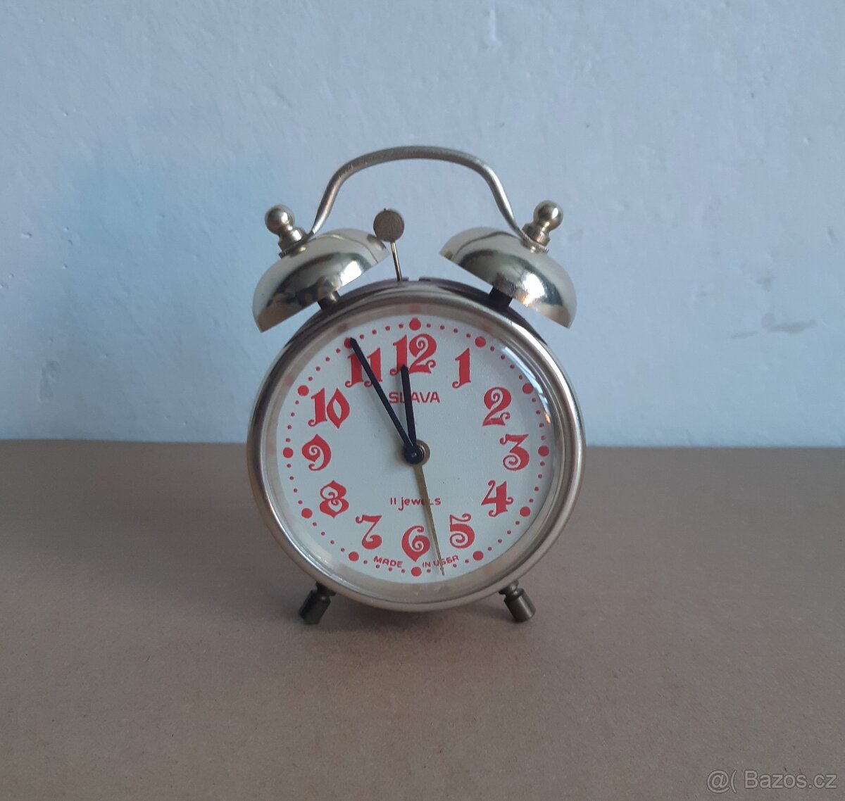 budík Slava na opravu