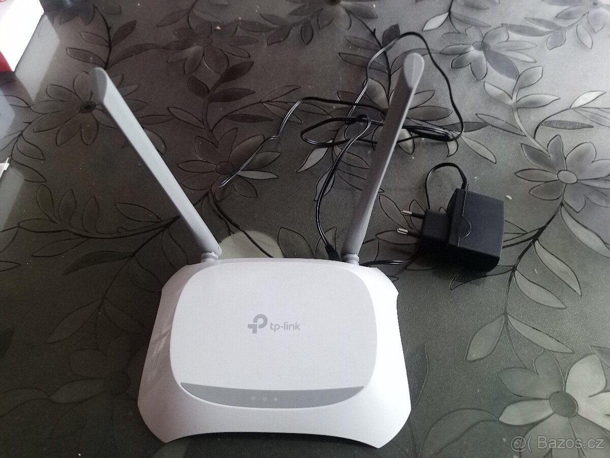Router zánovní