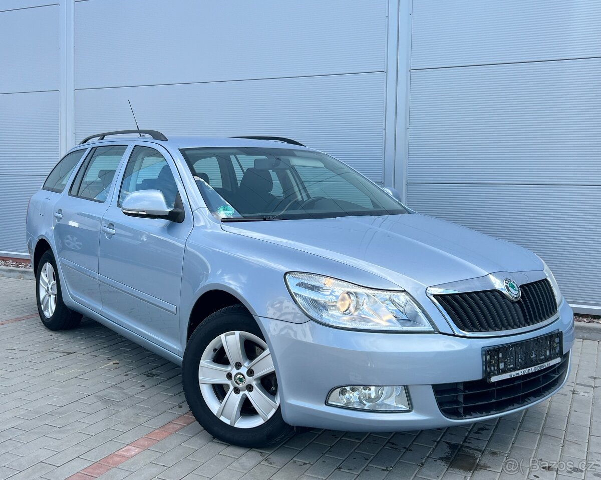 Škoda OCTAVIA II 1.6TDI 77KW Combi,Tažné,Alu R15,181TKM,Temp