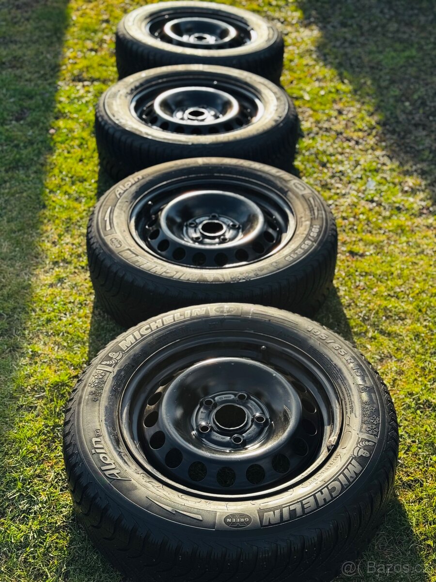 Plecháče z Golfa roztec 5x112 + R15 Michelin Alpin