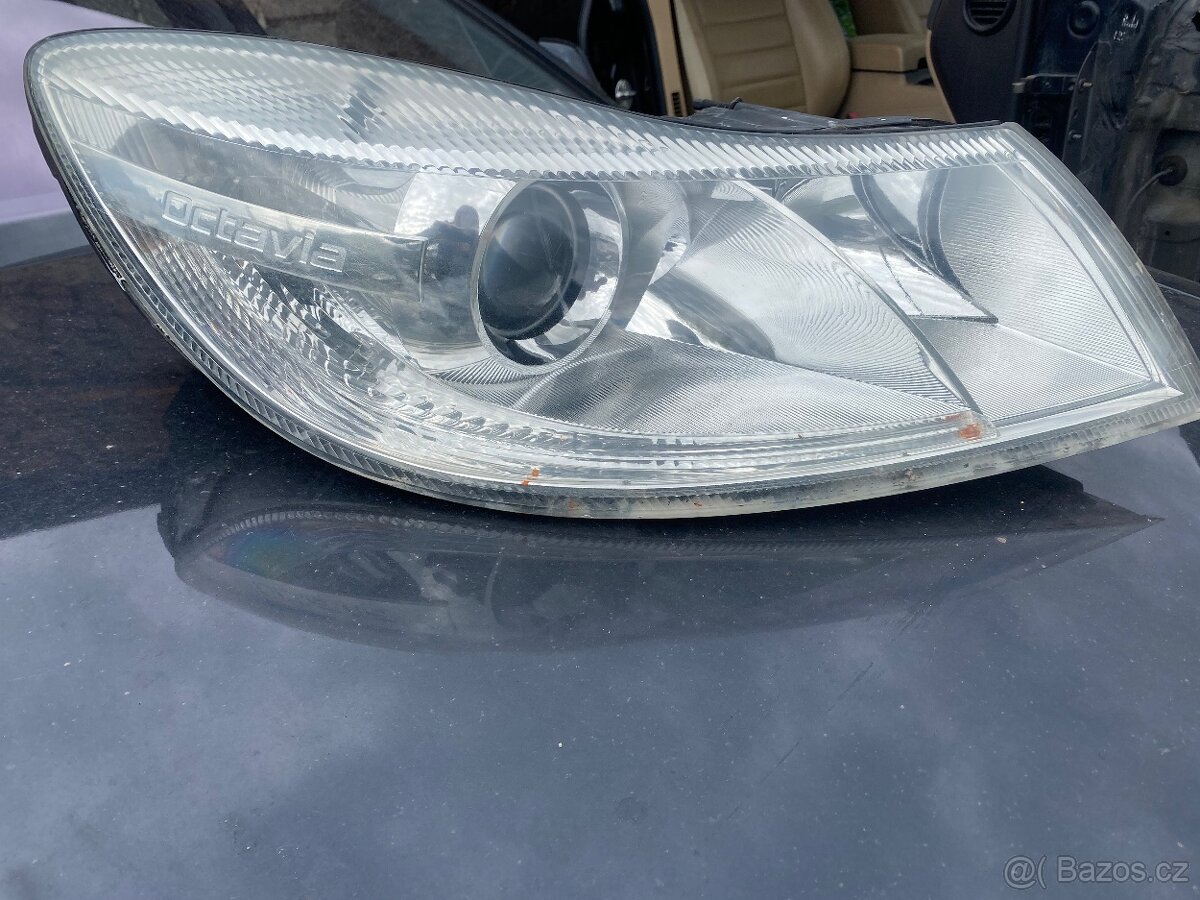 Originál svetla Octavia2 facelift,halogen s cockou