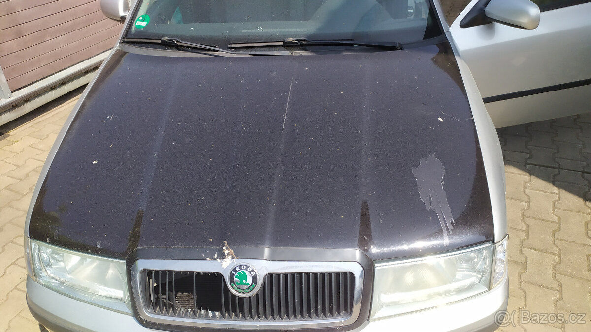 Přední kapota Škoda Octavia I černá a stříbrná