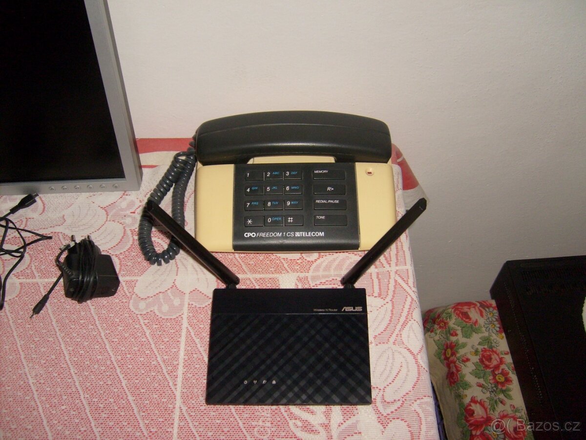 ROUTER ASUS ZA 200KČ