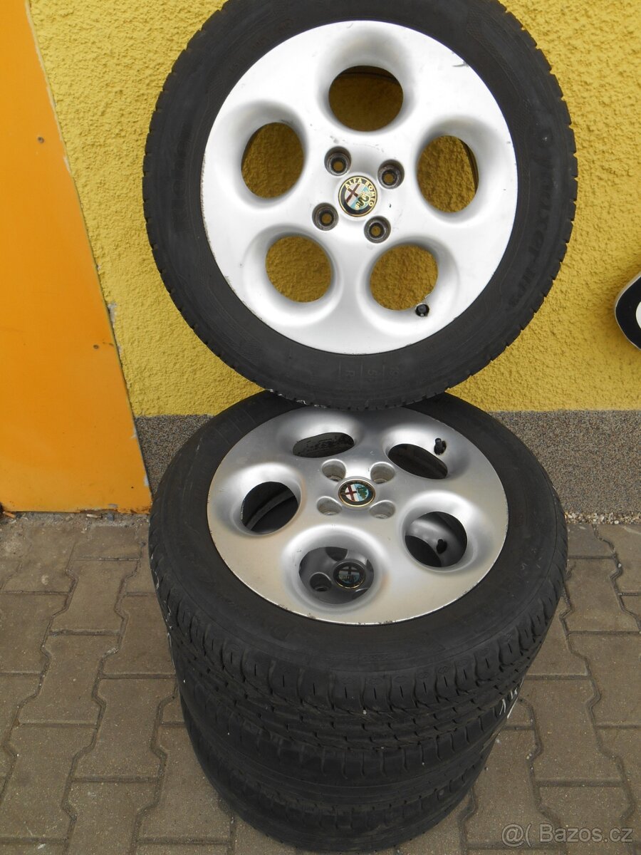 Alfa Romeo - orig. kola (alu disky+pneu 195/55 R15)