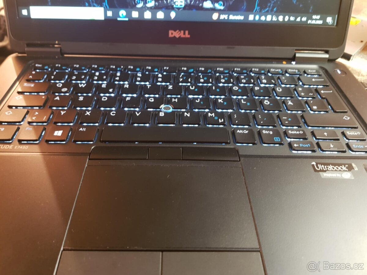 slušný notebook dell