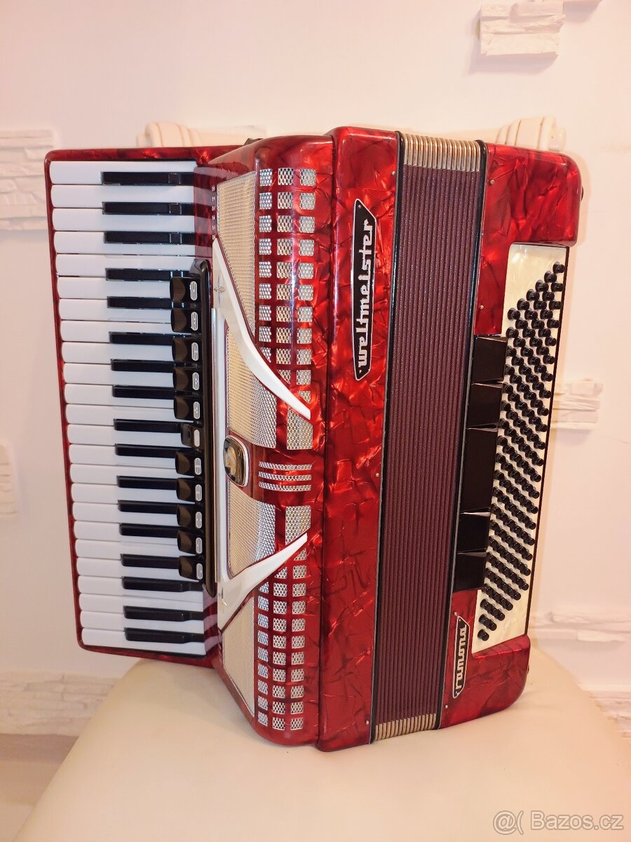 Opravář prodává  akordeon Weltmeister 120 basů