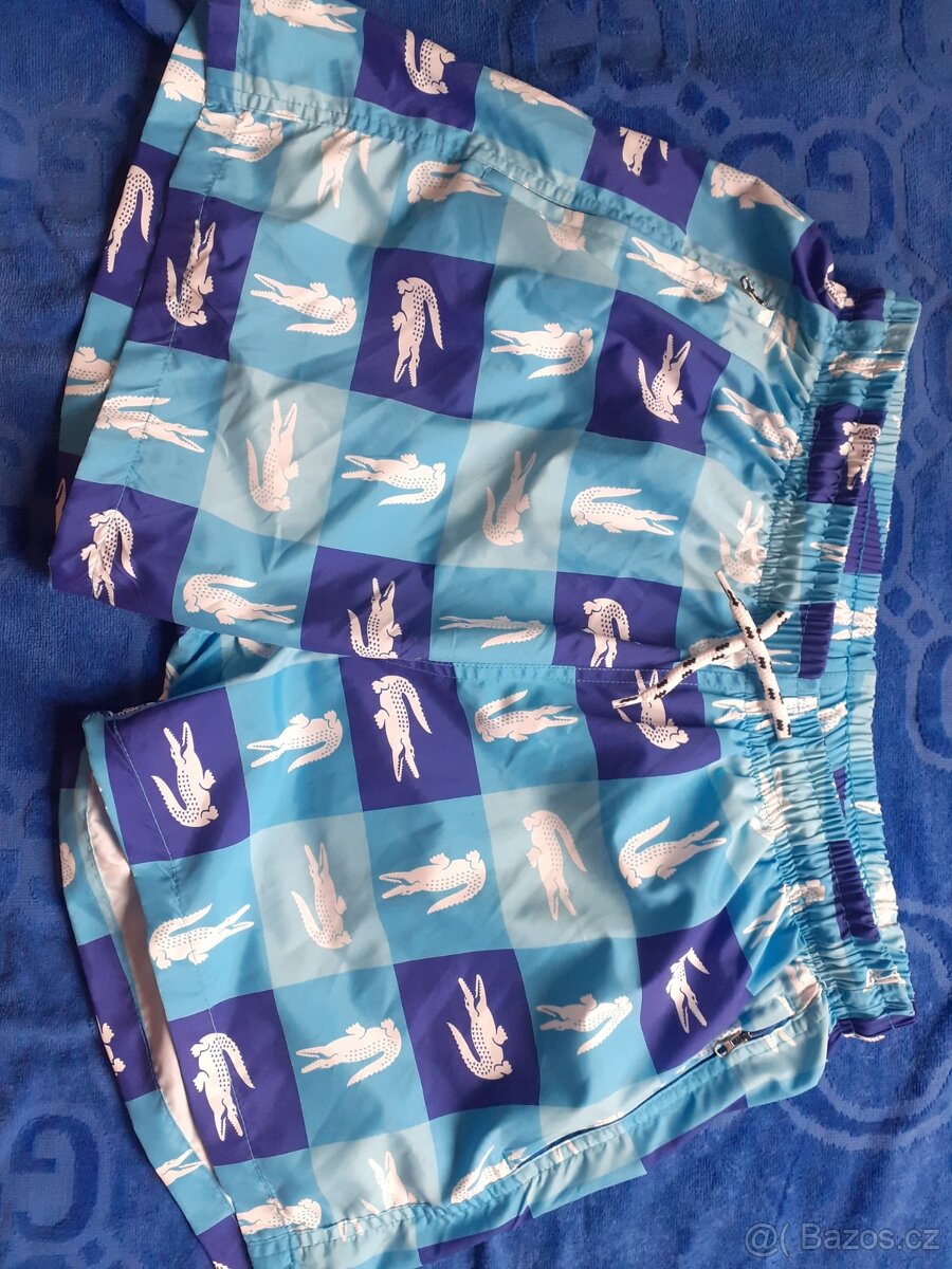 Bermudy , plavky , kraťasy , šortky Lacoste modré