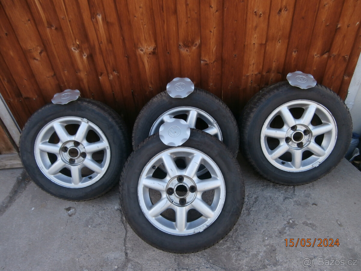 sada celoroční 185/60R 14 s orig.Alu disky vw