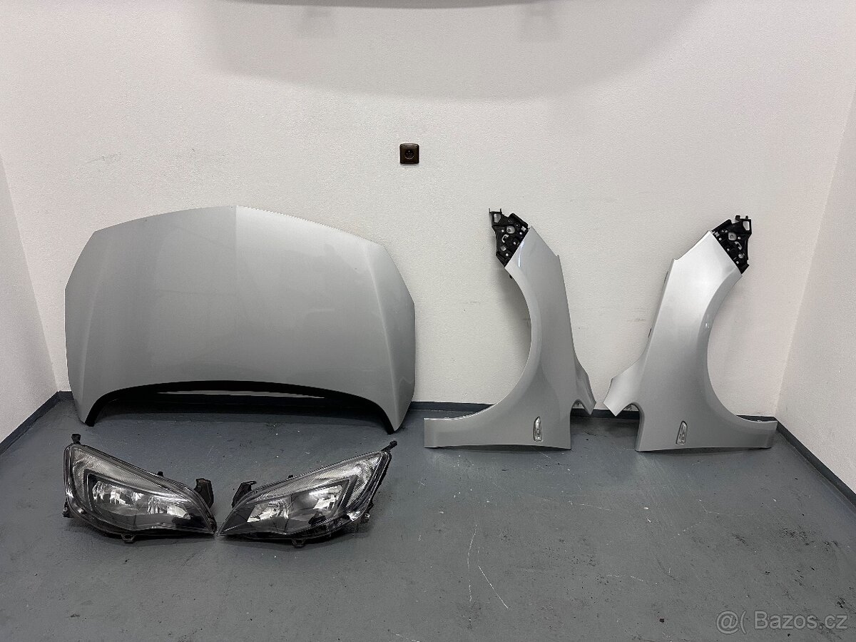 Opel Astra J přední část vozidla kapota blatníky světla