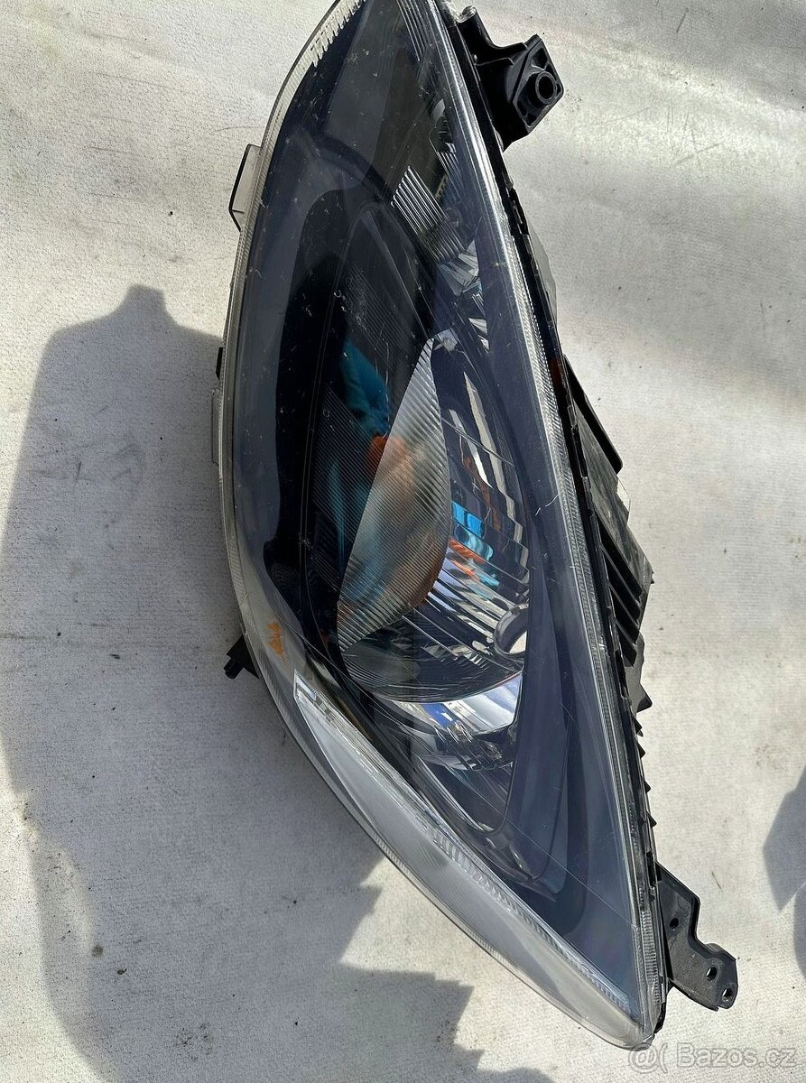 Mazda 2 DE, levé přední světlo