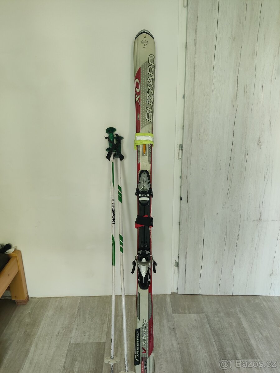 Lyže Blizzard 167cm s hůlkami. Jsou málo jeté široké hrany
