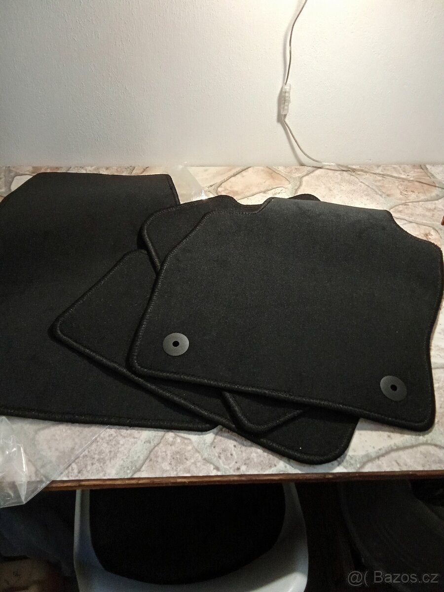 Textilní koberečky, rohožky + síť , orig.Škoda Fabia 4