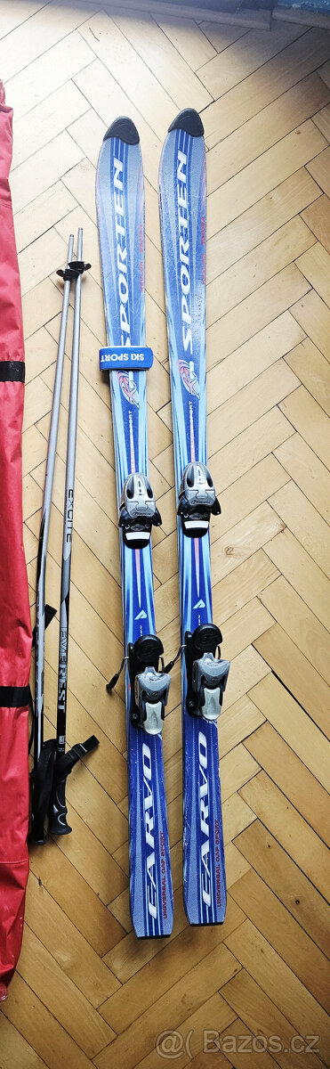 Kompletní lyžařský set (lyže, boty, hole)