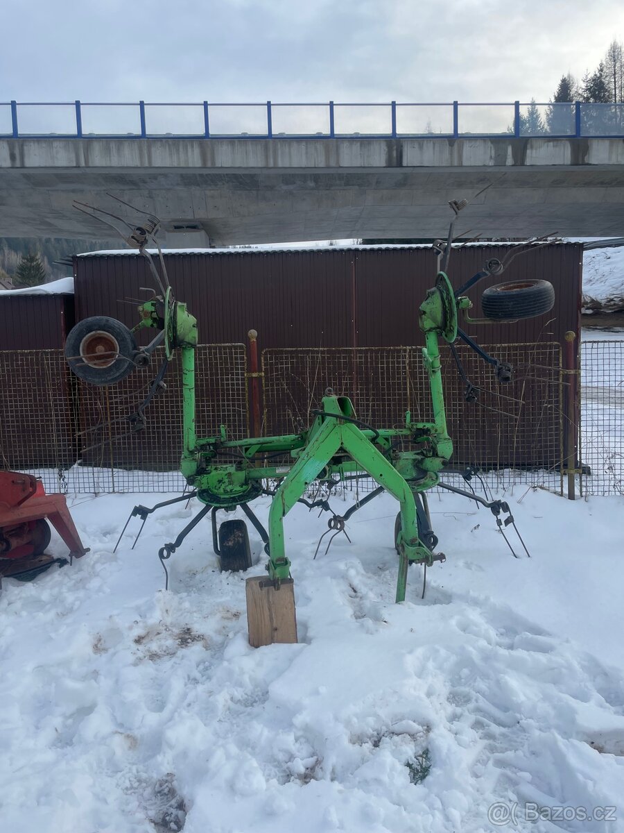 Obracec sena Deutz fahr 5,2m