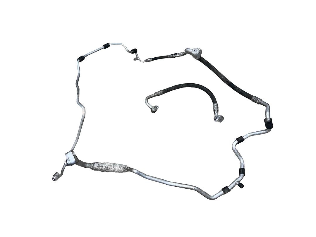 Trubky klimatizace 1T0820741AM VW Caddy 2k r.v. 2008